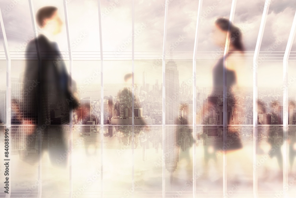 Poster composite image of business people walking in a blur
