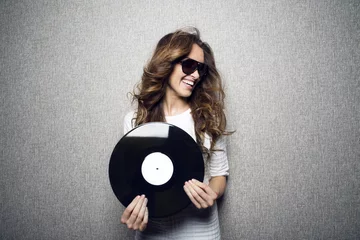 girl holds record © queen21