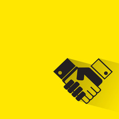handshake icon with long shadow.