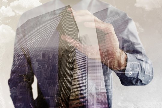 Composite image of hand of businessman showing smartphone