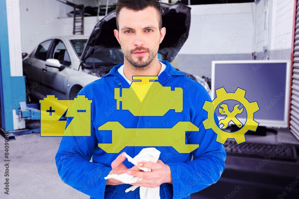 Poster composite image of mechanic wiping hands with cloth