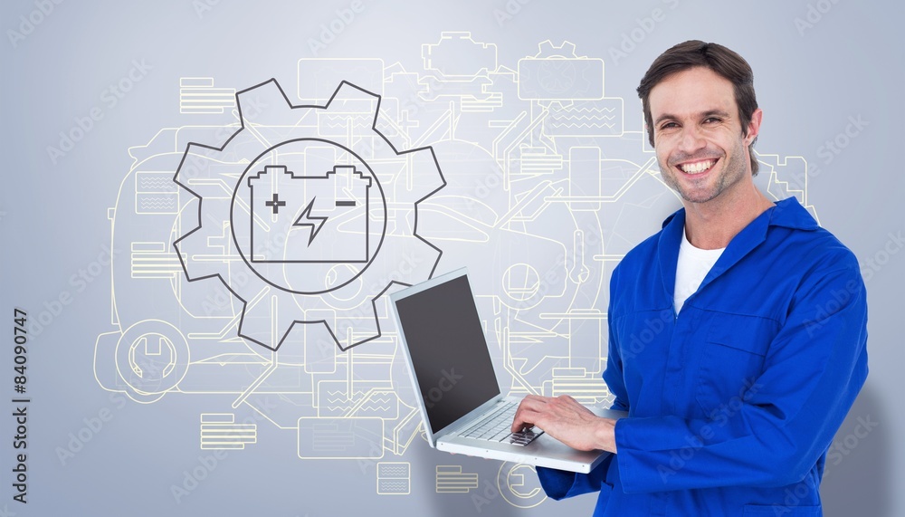 Poster composite image of handsome mechanic using laptop over white bac