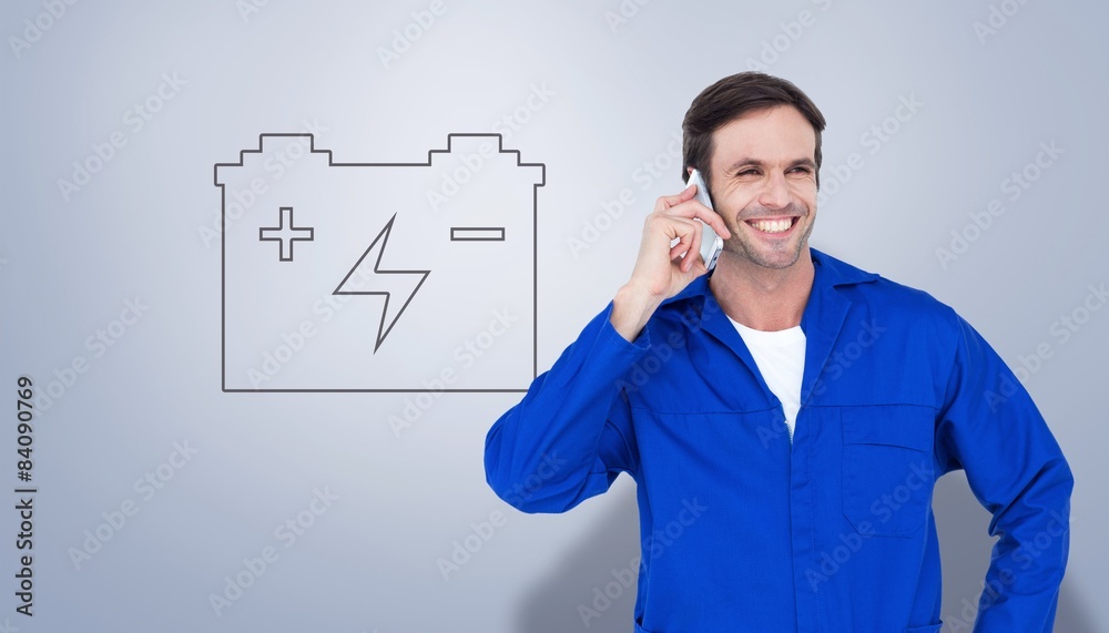 Poster Composite image of mechanic using mobile phone 