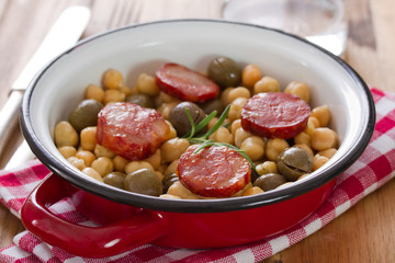 chick pea with smoked sausages on dish