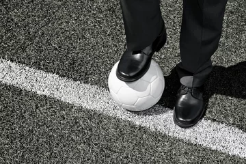 Crédence de cuisine en verre imprimé Foot Manager with Soccer Ball on the Touchline