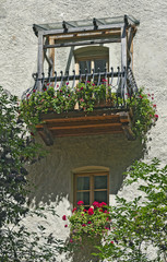 Balkon mit Blumen in Bruneck