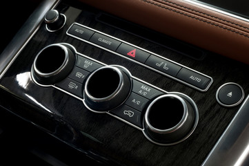 Fototapeta premium Car climate control panel. Interior detail.