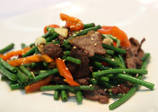 Chinese lagman spicy sauce with green beans, vegetables.