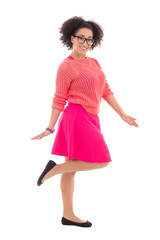 happy pretty african american teenage girl in pink isolated on w