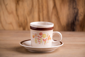 coffee cup with wooden background