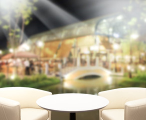 Table Top And Blur Building Background