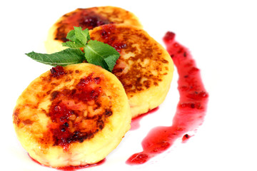 isolated on white close-up cheese pancakes
