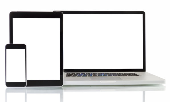 Modern laptop, smartphone, tablet pc on a white background