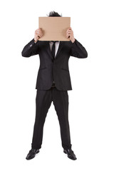 man in suit and cardboard poster