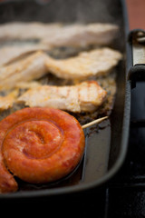 chicken sausages on a grill pan