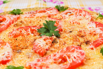 Omelet with cauliflower, tomatoes, fresh herbs and cheese