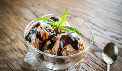 Chocolate ice cream with dessert topping
