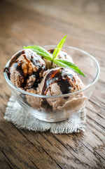 Chocolate ice cream with dessert topping