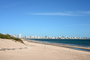 Fototapeta na wymiar Punta del Esre beach with apartment buildings, Uruguay