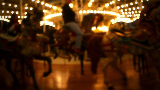 A merry go round is operational at night