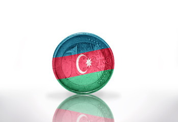 Naklejka premium euro coin with azerbaijani flag on the white background