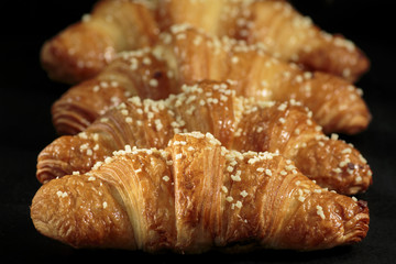 Croissant sprinkled with white chocolate
