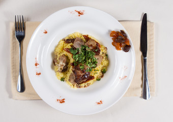 Prepared Dish Garnished with Dried Fruit