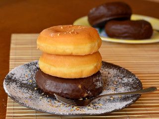 Stack Of Homemade Donuts On The Brown Plate 