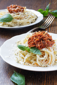 Pasta spaghetti with tomato sauce basil and parmesan