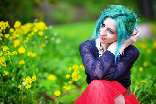 Beauty Romantic Girl With Green Hair In Park