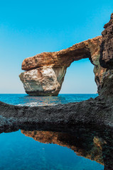 Azure Window, famous stone arch of Gozo island in the sun in summer, Malta - obrazy, fototapety, plakaty