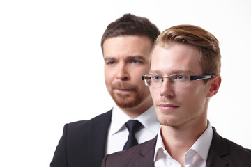 close-up portrait of two young businessmen