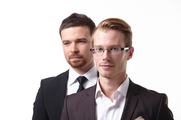 close-up portrait of two young businessmen