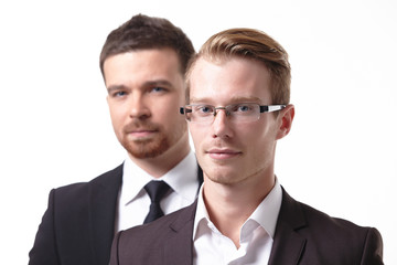 close-up portrait of two young businessmen
