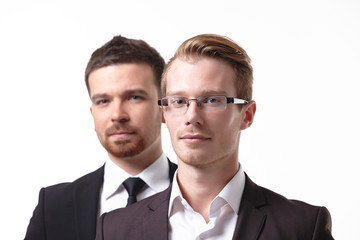 close-up portrait of two young businessmen