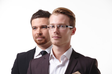 close-up portrait of two young businessmen