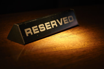 Reserved plate on a table in a restaurant