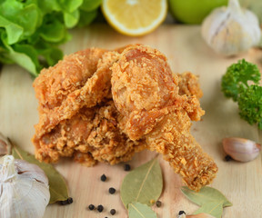 fried chicken isolated on wooden  background