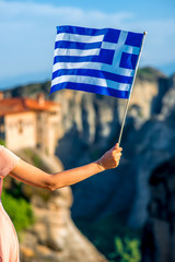 Greek flag on the mountains background
