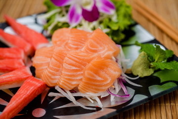 Salmon sashimi Serve with crab Served with wasabi