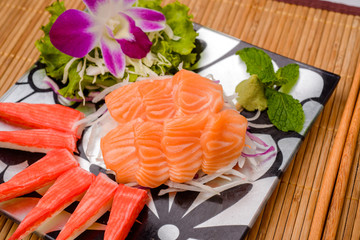 Salmon sashimi Serve with crab Served with wasabi