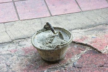 Naklejka premium Mixing a cement in tank