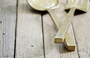brass spoon and fork