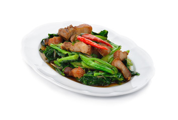 Thai food fried kale with crispy pork