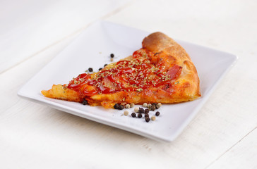 Delicious italian pizza served on white plate