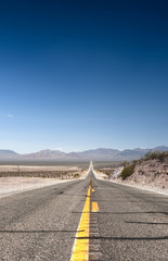 Long Distant Highway Under the Sun Across Death Valley National