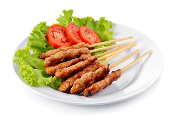 Roasted pork on white plate.