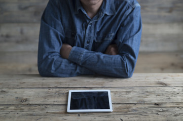 Men are watching a movie on a tablet