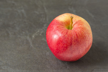 Fuji Apple on slate background