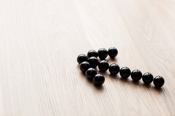 Arrow maked from black balls